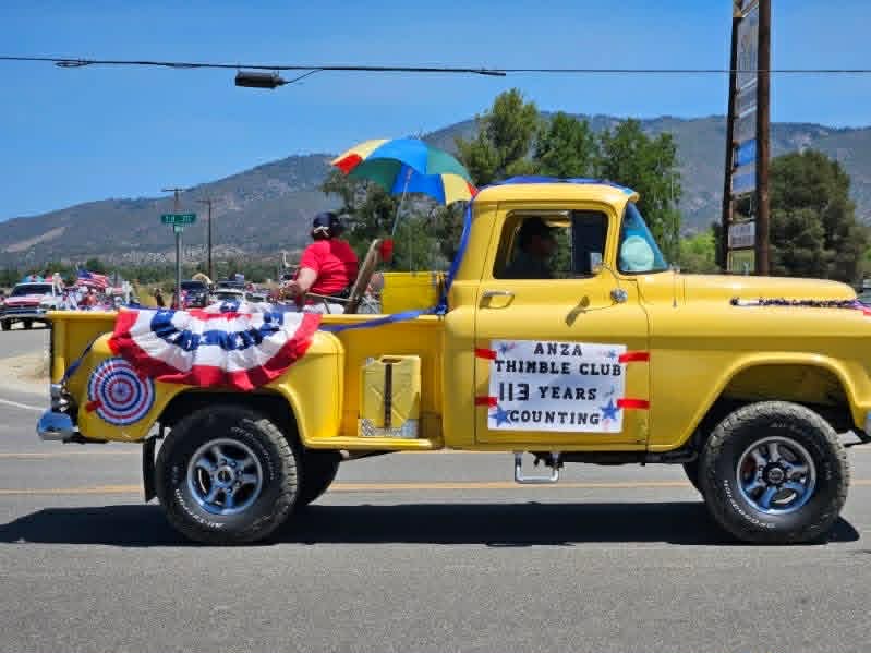 Yellow Thimble Club truck in the parade